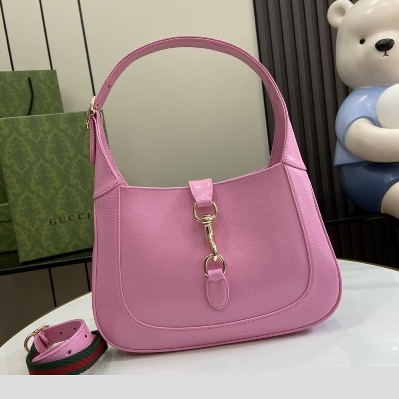 G*u*i top handle bags
